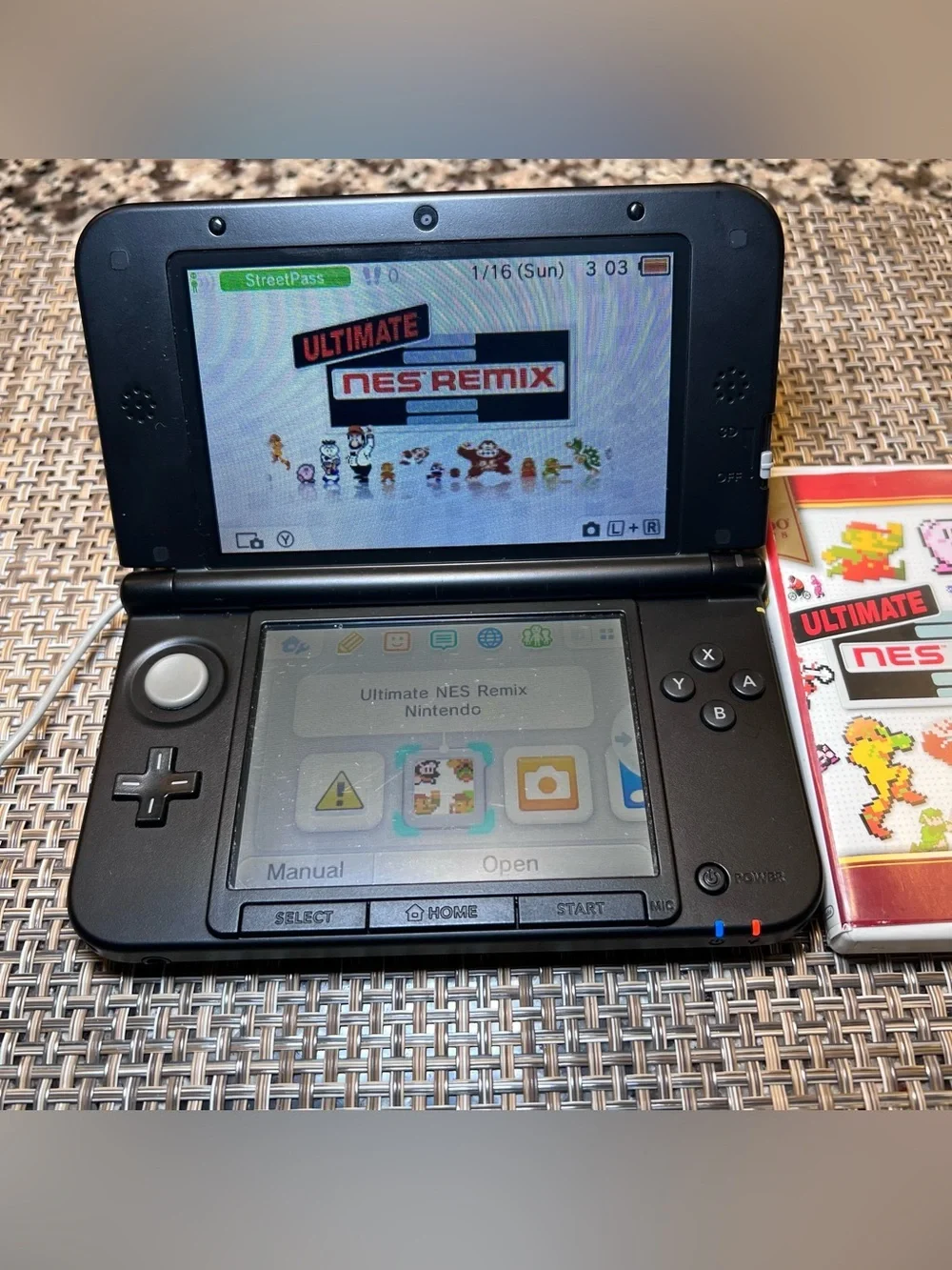 Nintendo 3DS XL Handheld Console in Black with Ultimate NES Remix